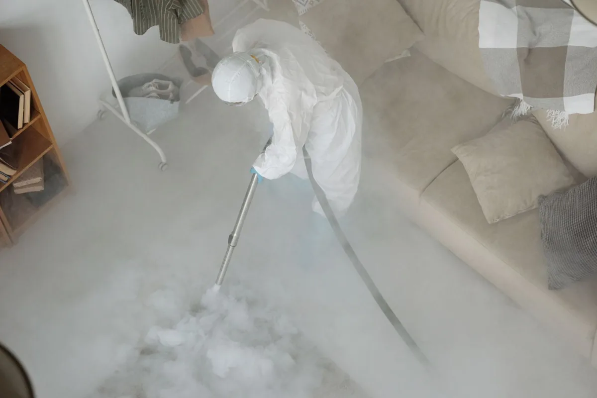 Biohazard cleanup technician in protective equipment, Cooper City, FL